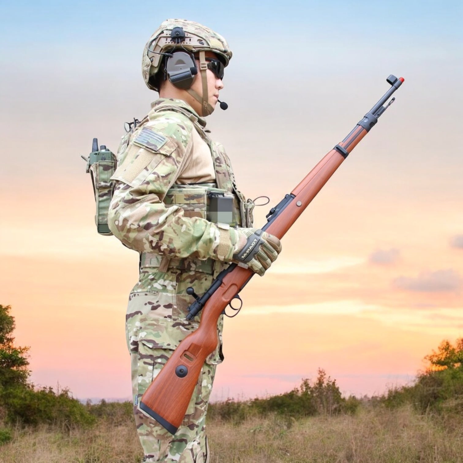 Dude holding a Hanke Mauser Kar98k Nylon Bolt-Action Spring-Operated Gel Blaster Replica Rifle - Light wood colour